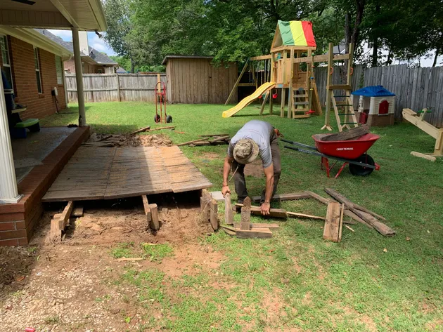 Back Porch and Deck Demolition Back porch demolition and deck removal in a residential backyard