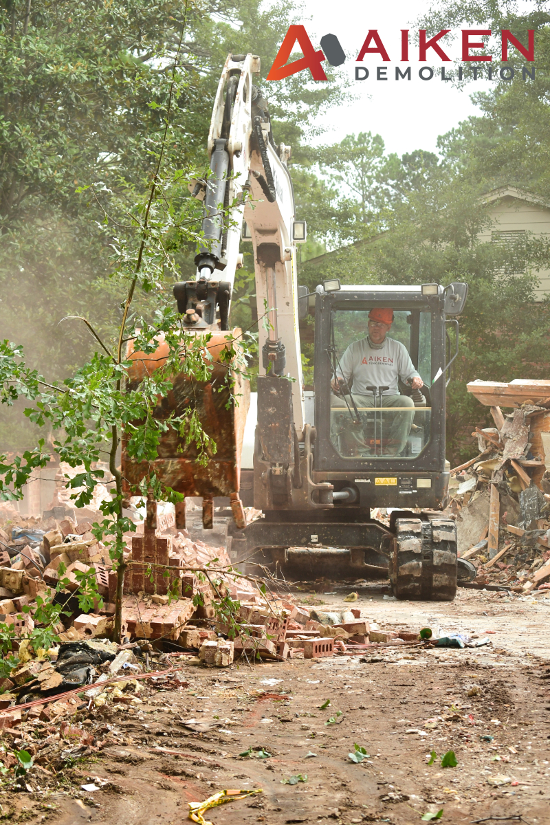 AD7 Small outdoor building being demolished during a property cleanup project