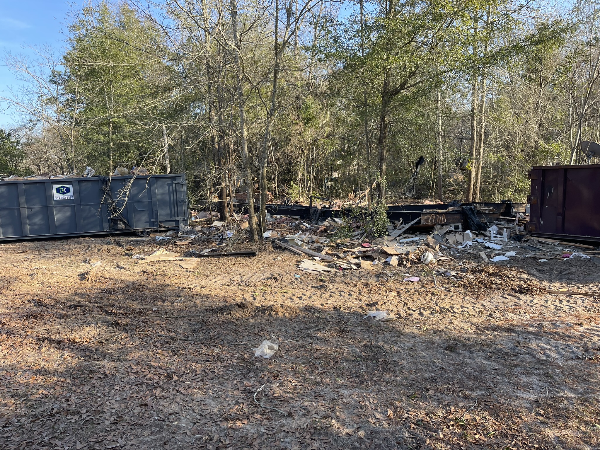 Mobile home demolition debris being loaded for removal in New Ellenton SC
